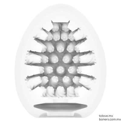 Huevo masturbador Tenga Egg Cone con textura de conos. Imagen del interior texturizado